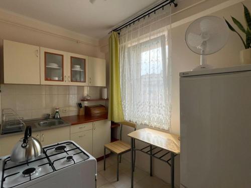 Nhà bếp/bếp nhỏ tại Miłe mieszkanie w pełni wyposażone