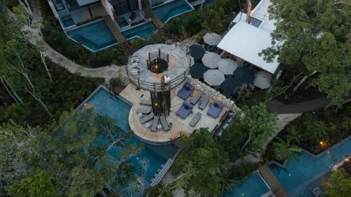 an overhead view of a resort with a swimming pool at Siwa Tulum in Tulum