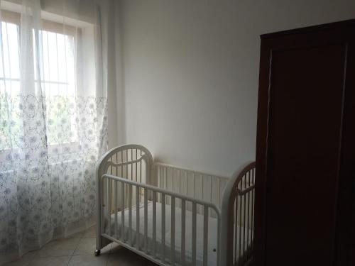 Letto o letti in una camera di Casa indipendente