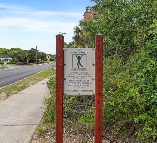 a sign on the side of a road at Cabana Palms - Oceanfront Renovated King Bed Sauna in Myrtle Beach