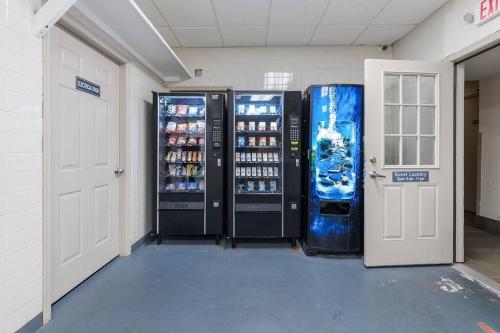 a room with two refrigerators with drinks in it at Cabana Palms - Oceanfront Renovated King Bed Sauna in Myrtle Beach