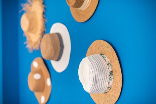 a pair of shoes on a blue background at Sweet home in Koukaki in Athens
