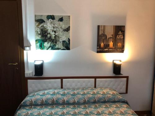 Una cama o camas en una habitación de Le Terrazze