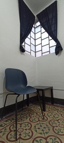 Istumisnurk majutusasutuses Hostal Casa Azul, Chantli
