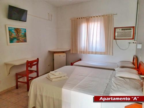 Postel nebo postele na pokoji v ubytování Rial Hotel