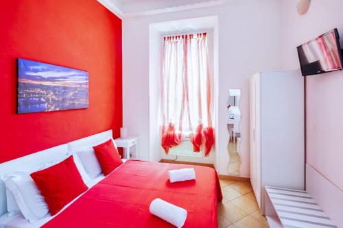 Tempat tidur dalam kamar di B&B Rome's Angel