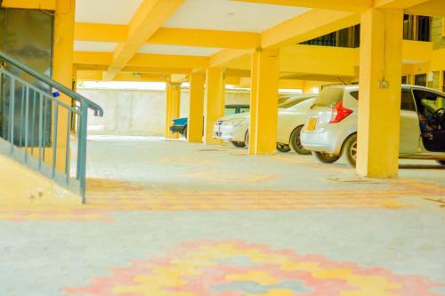 an empty parking lot with cars parked in a building at DANA HOMES in Nairobi