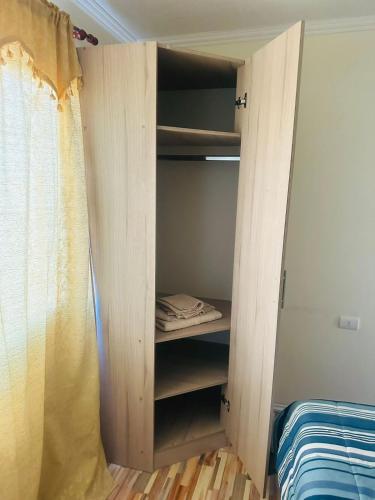 Postel nebo postele na pokoji v ubytování Departamento amoblado calama