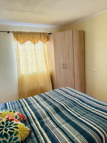 Postel nebo postele na pokoji v ubytování Departamento amoblado calama