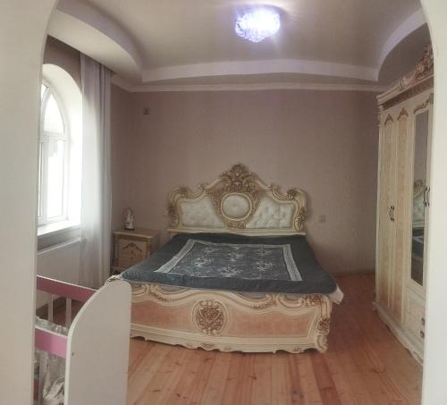 Postel nebo postele na pokoji v ubytování Golden Villa