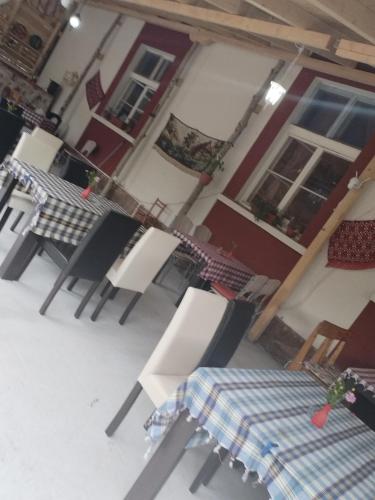 an overhead view of a patio with tables and chairs at Etno Konak Angela in Kalna