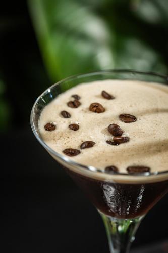 a martini glass with coffee beans in it at NEW IPOINT HOTEL in San Giovanni in Persiceto