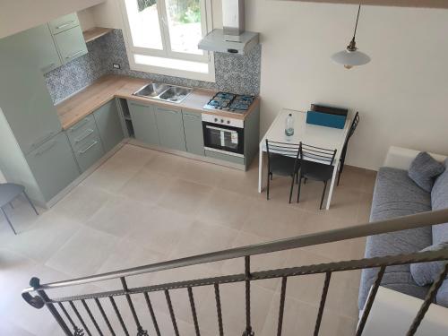 Kuchyň nebo kuchyňský kout v ubytování La casetta della Pigna Verde