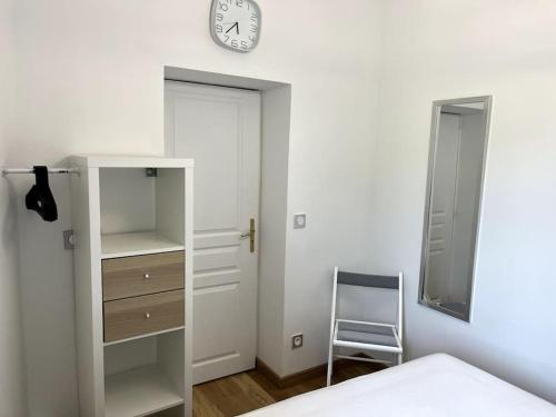 מיטה או מיטות בחדר ב-Deauville: superbe appartement