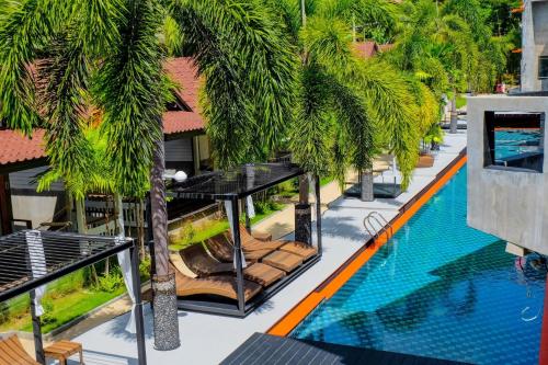 an aerial view of a resort with a swimming pool at See Through Resort Haad Yao in Haad Yao