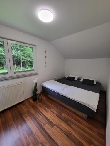 Postel nebo postele na pokoji v ubytování Green Garden House