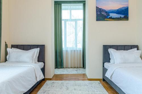 Кровать или кровати в номере Hostel Compass 3