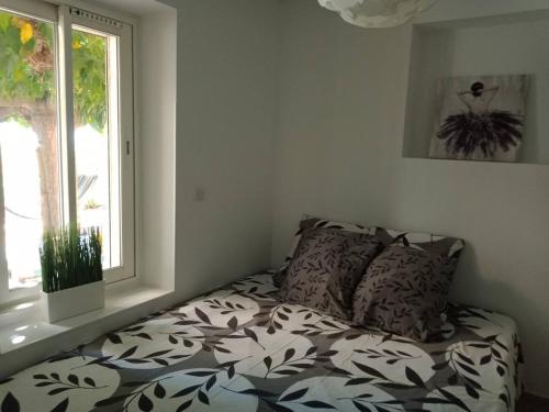 Cama o camas de una habitación en Chez Anne