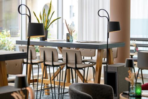 Un restaurante u otro lugar para comer en Mercure Hotel Berlin City