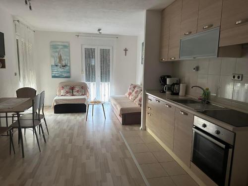 Kuchyň nebo kuchyňský kout v ubytování Apartment Veronika