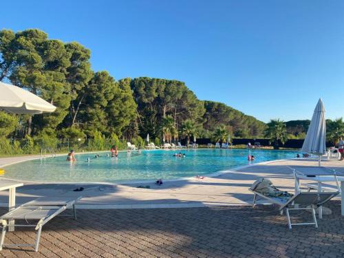 Bazén v ubytování Interno H10 - Olimpia Residence nebo v jeho okolí