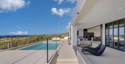 an image of a house with a swimming pool at Villa Regatta in Hato
