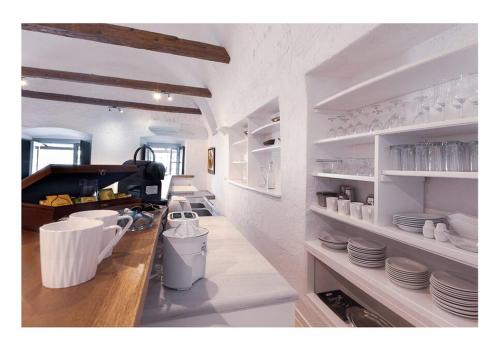 Virtuvė arba virtuvėlė apgyvendinimo įstaigoje Apanemo seaside house