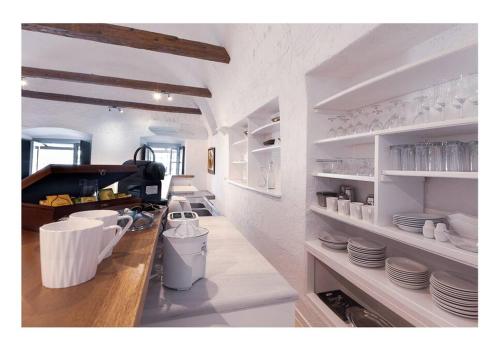 Kuchyň nebo kuchyňský kout v ubytování Apanemo seaside house