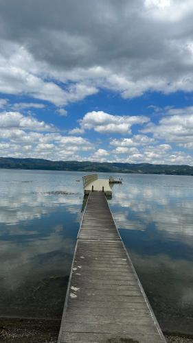 a dock on a large body of water at Villa by Lake Sapanca in Sapanca
