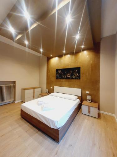 מיטה או מיטות בחדר ב-Casa Tiffany