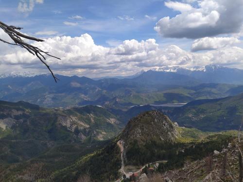 a view of a mountain valley with a road at O Elatos in Loutra Amarantou