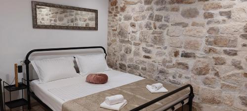 Postel nebo postele na pokoji v ubytování APARTMAN B