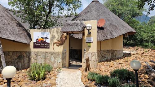 a small building with a sign in front of it at Bona Intaba Game Lodge in Hoedspruit