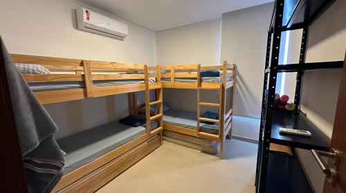 Katil atau katil-katil dalam bilik di Apartamento Carneiros 102D - Reserva dos Carneiros