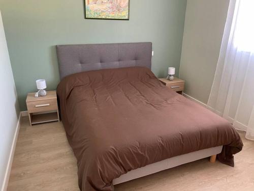 Postel nebo postele na pokoji v ubytování Chez ERIC
