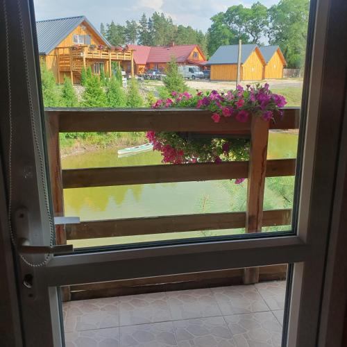 Un balcón o terraza de Domek Pod Akacjami