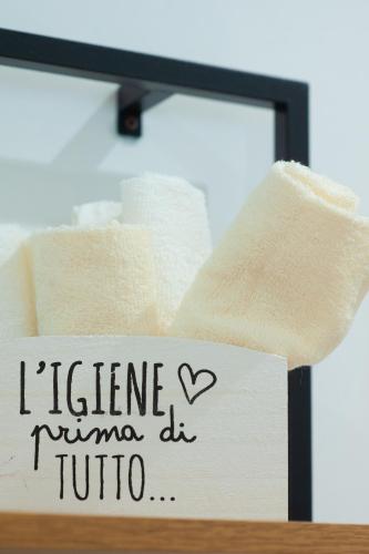 a sign that says iineriticma at toilet paper at Corte Giorgi in Breno