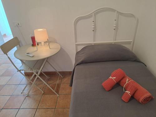 Postel nebo postele na pokoji v ubytování Dimora Agata 21