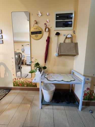 a dressing room with a table and a mirror at 40 sqm Studio Unit 7 pax Maximum Eco-Friendly Cozy Cove with Balcony at The Venice Grand Canal Mall PARKING ON PREMISE with Pool in Manila