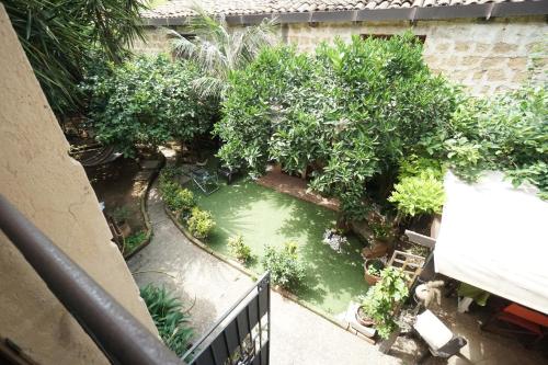 an overhead view of a pond in a garden at Room in Villa Galletti Inguaggiato in Bagheria