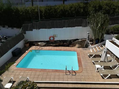 Vacaciones al sol San Agustin con piscina y WIFI