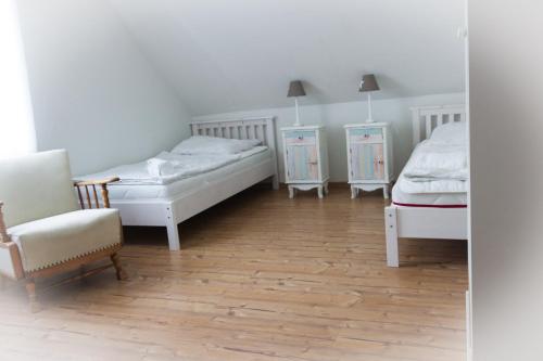 Katil atau katil-katil dalam bilik di Staberhuk Baben - großer sonniger Balkon - XL Wohnung