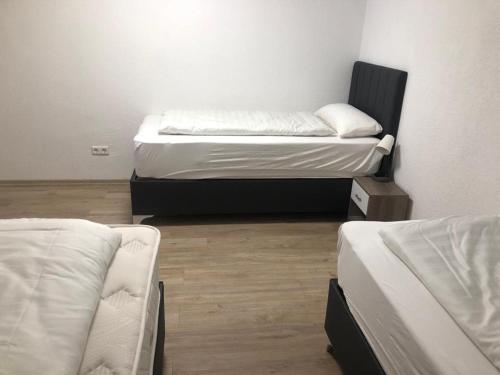 Кровать или кровати в номере Erbacher Ferienwohnung 2