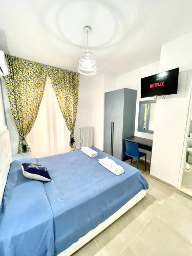 Ένα ή περισσότερα κρεβάτια σε δωμάτιο στο B&B Marconi