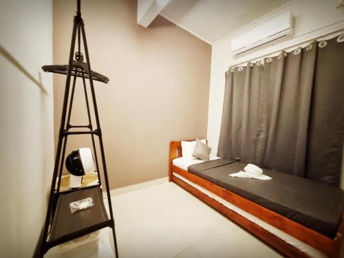 a room with a bed and a ladder in it at USJ Subang Jaya Sunway Paradise Home Staycation-PH1346 in Subang Jaya