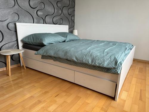 Postel nebo postele na pokoji v ubytování Apartments Spačilova nearly center