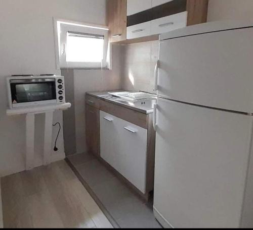 A cozinha ou cozinha compacta de Apartman-kuća-Žabljak