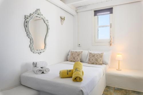 Ένα ή περισσότερα κρεβάτια σε δωμάτιο στο Seablue Villas