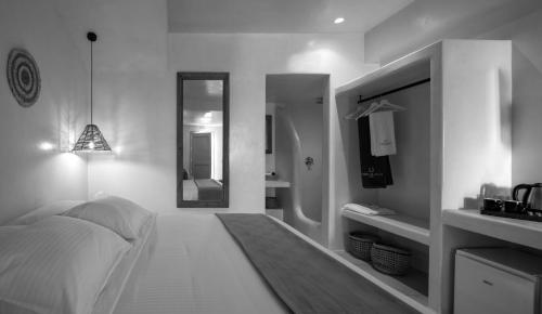 Katil atau katil-katil dalam bilik di Terra Blanca Suites