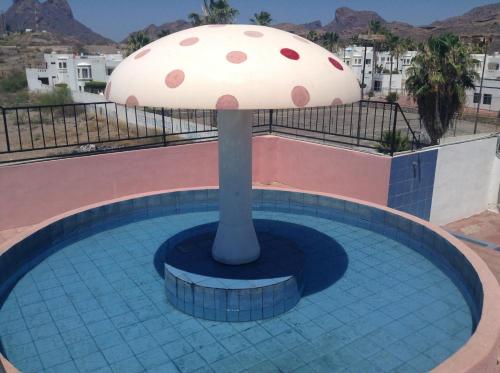 Los Jitos Hotel & Suitesの敷地内または近くにあるプール